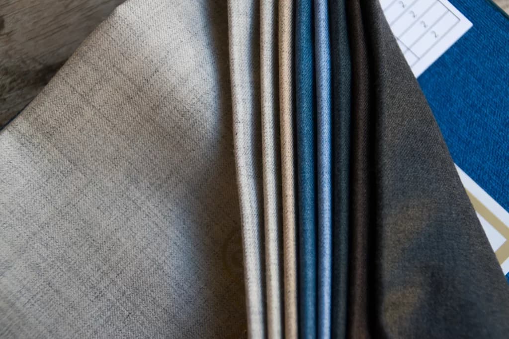 Grey, blue, and brown suiting swatches at Khimji's, Dar es Salaam